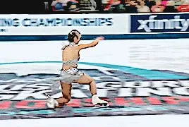 alysa liu doing a dramatic knee slide as she drags her hands down her face