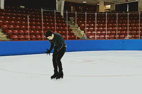 jacob sanchez doing a practice skate of his show program set to 'your idol' from k-pop demon hunters. he does a choreographic move borrowed from the song's original choreography in the movie where he leans his head back, covering his face with his hands
