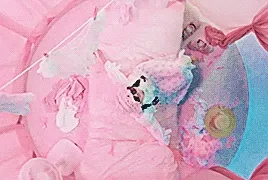 matsumoto karen flopping onto a frilly bed, camera from above